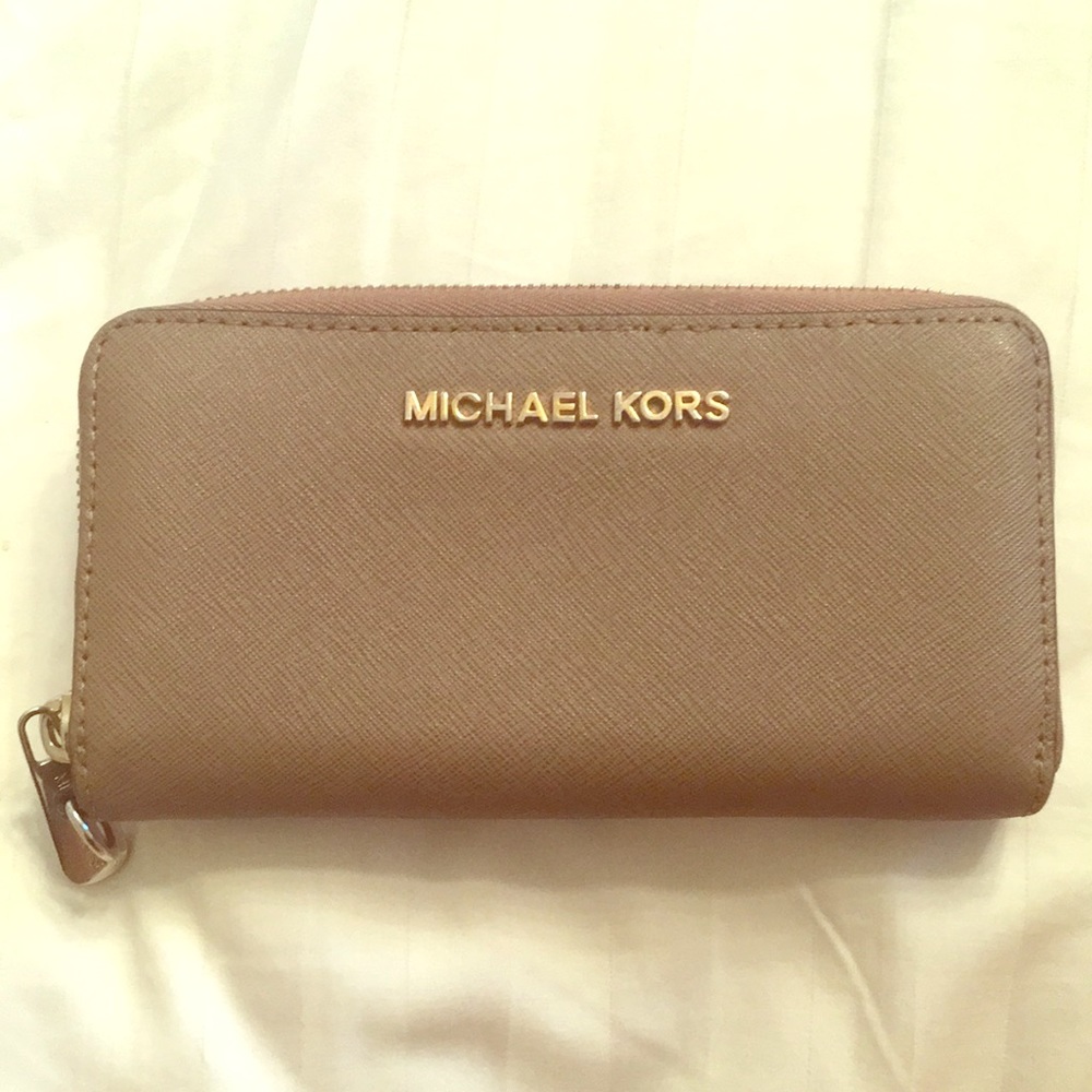 Michael Kors zip closure wallet.